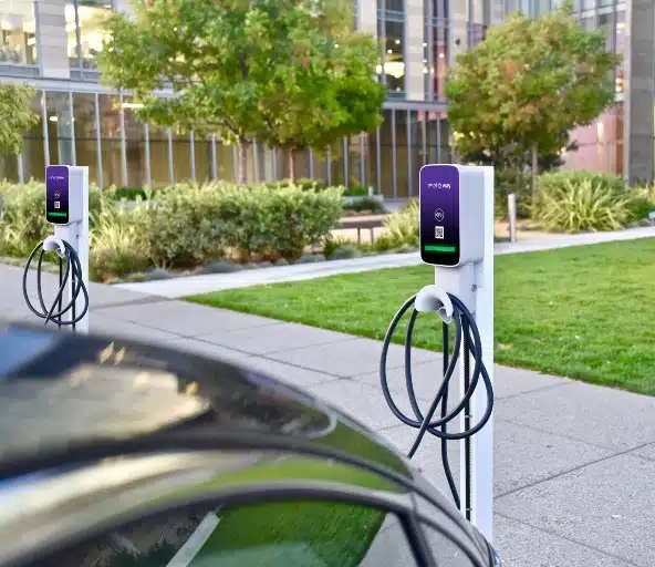 multiple enel x charging stations outside of business center